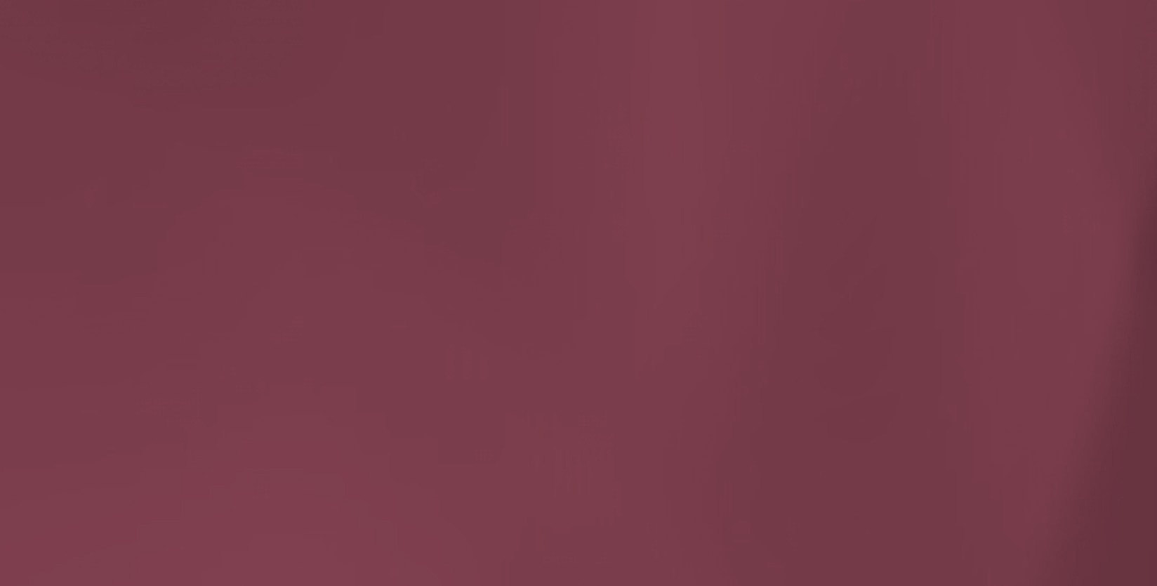 Solid burgundy background texture.
