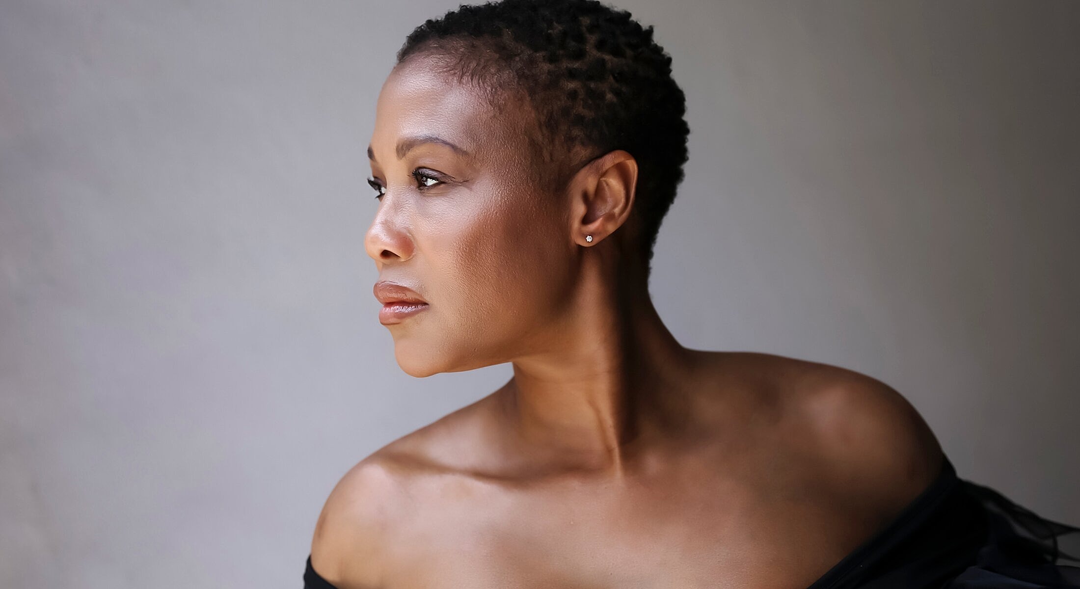 Portrait of a woman with short hair.